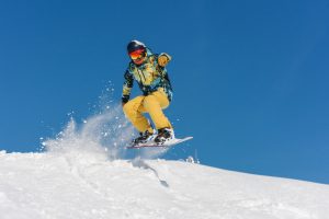hacer snowboard