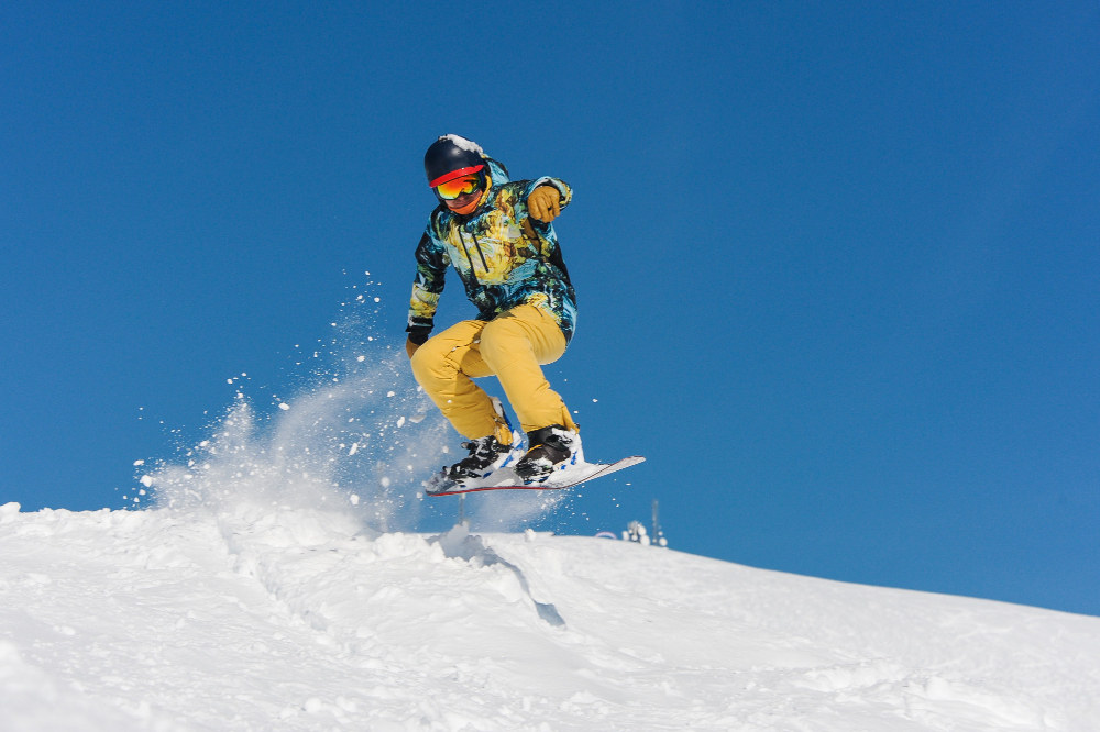 hacer snowboard